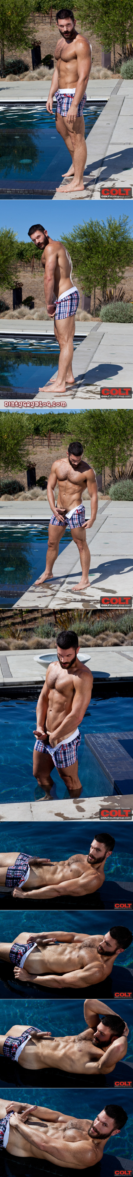 Muscular, hairy-chested man strips off his swim trunks and masturbates in the pool.