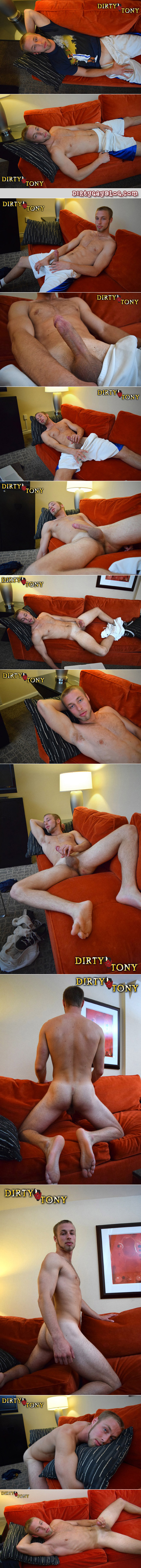 Hairy blonde guy jacking off on the couch through his athletic shorts.