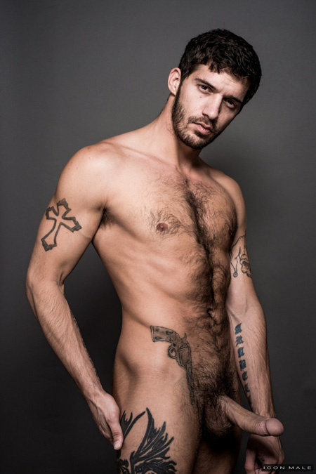 Well-hung hairy young bearded muscle guy nude.