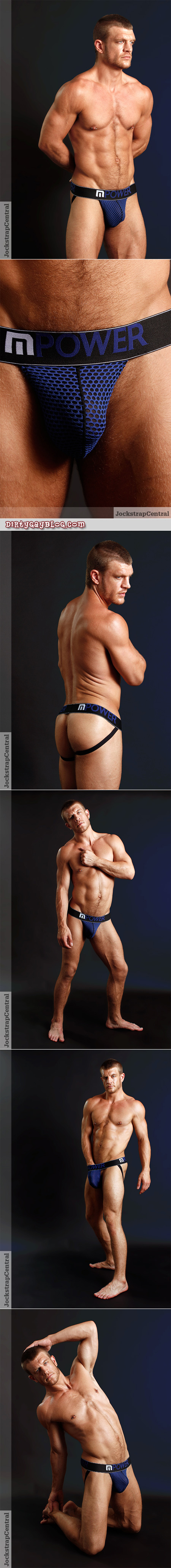 Blonde haired blue eyed hairy muscle hunk posing in a jockstrap.